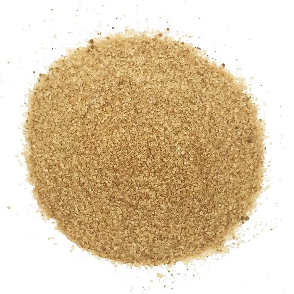 An overhead view of a pile of pumpkin spice vanilla sugar.